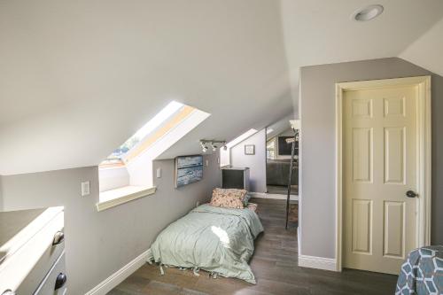 a bedroom with a bed in a room with a window at Stunning Home in Orange County with Stables! in Orange