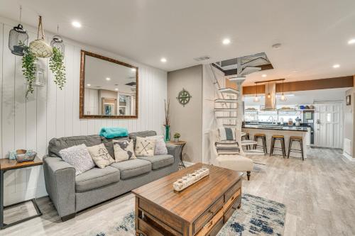 a living room with a couch and a table at Family Home with Private Pool 24 Mi to Disney! in Saint Cloud