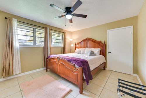 a bedroom with a bed with a ceiling fan at Baton Rouge Vacation Rental with Yard 10 Mi to LSU! in Baton Rouge
