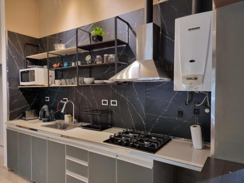 Кухня или мини-кухня в SLB Apart - Duplex
