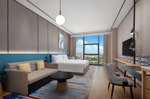 Гостиная зона в Hilton Garden Inn Shenzhen Guangming Hongqiao Park