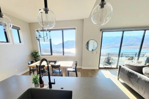 a kitchen and living room with a view of the ocean at The views! Enjoy this Hideout home. in Keetley