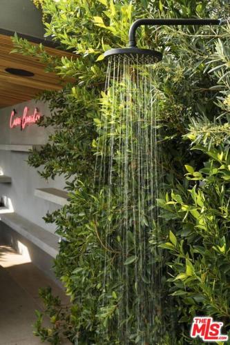 a plant hanging from the side of a building at Casita Villa- 5 bedrooms in Los Angeles