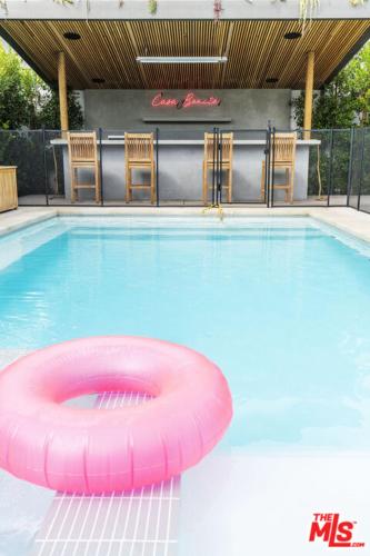 a pink frisbee in a swimming pool at Casita Villa- 5 bedrooms in Los Angeles