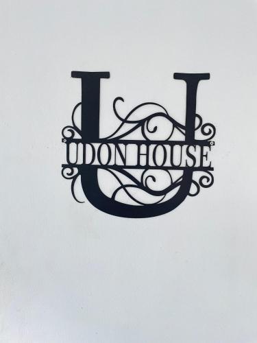 a sign with the words i umbrellaulse at Udon House in Udon Thani
