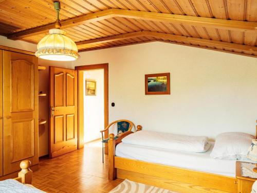 Кровать или кровати в номере Apartment near Petzen Ski Slopes