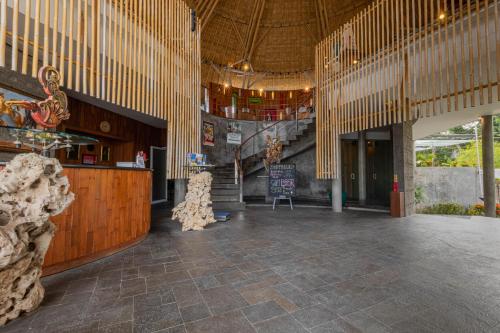 a large room with a staircase in a building at Taman Mesari Luxury Villas-Seminyak in Seminyak