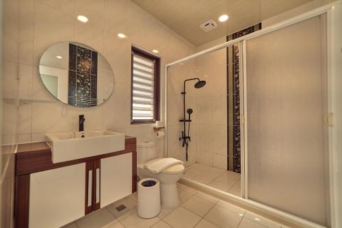 Un baño de Cliff Villa