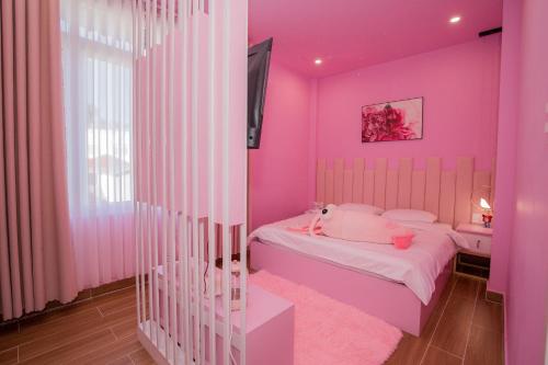 Кровать или кровати в номере Suri Homestay