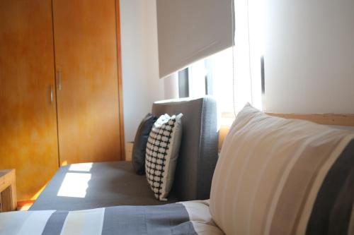 Katil atau katil-katil dalam bilik di RE+Wood Guesthouse