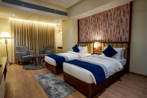 Cama ou camas em um quarto em M2 Square by Monday Premium