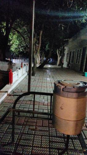 a drum sitting on a stand on a street at Hotel Sambodhi International, Madhya Pradesh in Sānchi