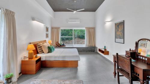 Gallery image of SaffronStays Cafella- A 3-BDR elliptical-roof villa in Chikmagalur in Mudigere