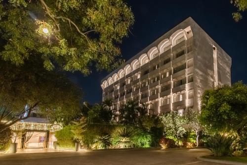 a rendering of a hotel at night at Southern Star,Mysore in Mysore