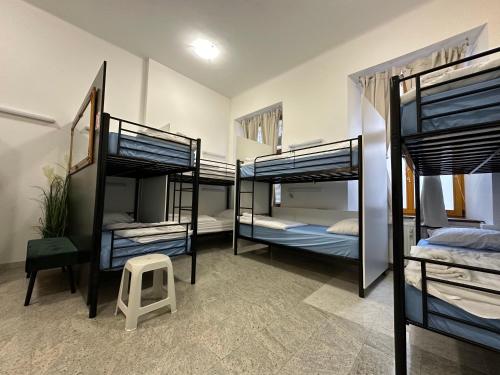 a room with four bunk beds in it at Hostel Opera in Ljubljana