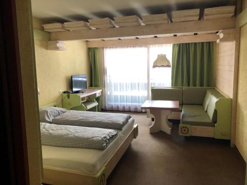 Ένα ή περισσότερα κρεβάτια σε δωμάτιο στο B&B in Seefeld