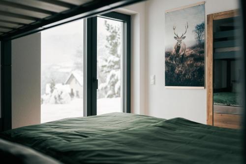 Chalets Woid_Liebe&Glückにあるベッド