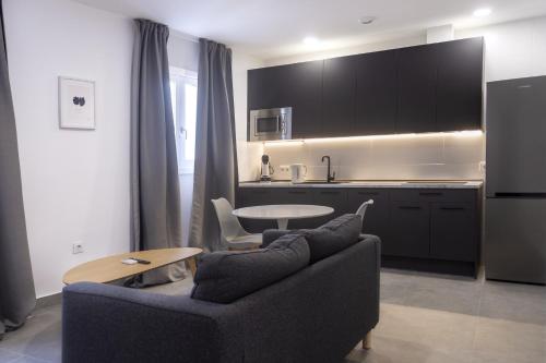 Η κουζίνα ή μικρή κουζίνα στο Apartamentos La Tahona Cádiz Centro