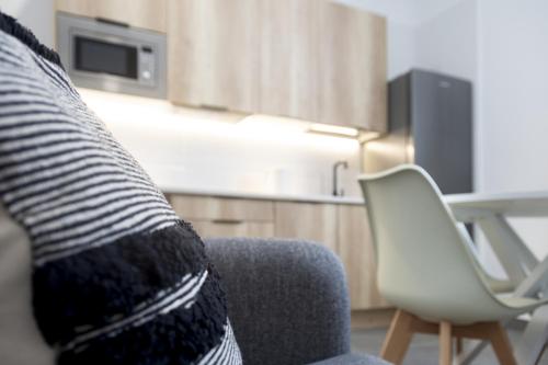 Η κουζίνα ή μικρή κουζίνα στο Apartamentos La Tahona Cádiz Centro