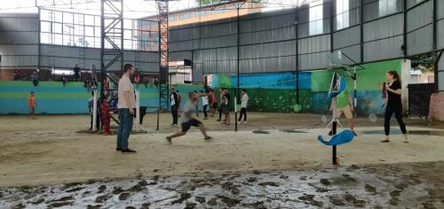 a group of people playing in a playground at KIRTIPUR COMFORT HOMESTAY with breakfast & dinner in Kirtipur