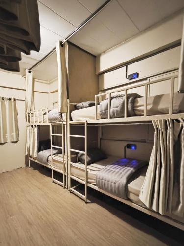 Postel nebo postele na pokoji v ubytování Youyen Hostel