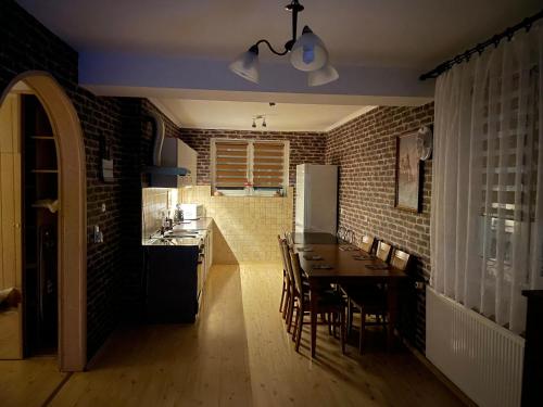 Kuchyň nebo kuchyňský kout v ubytování Apartament XXL