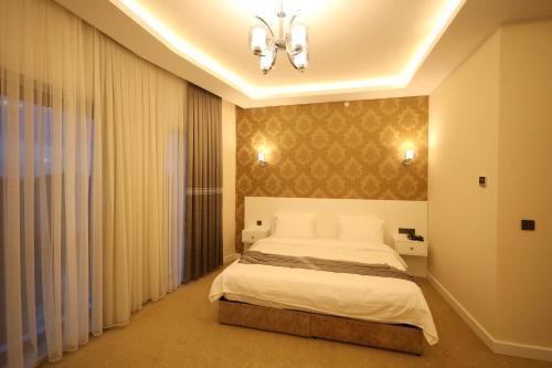 Letto o letti in una camera di Green Roof Boutique Hotel & SPA Istanbul Airport