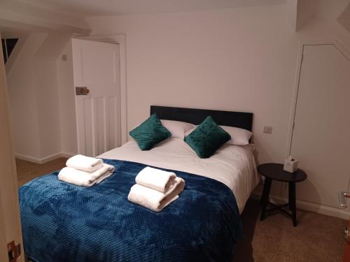 En eller flere senge i et værelse på Beckview En-Suite