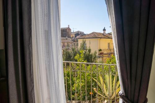 a view of a city from a window at B&B La Finestra Sui Tetti in Lanciano