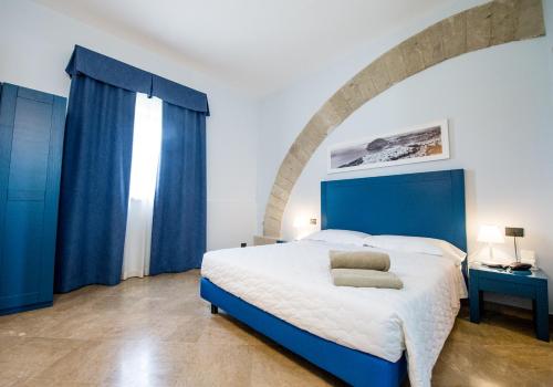 Postel nebo postele na pokoji v ubytování Resort I Mulini
