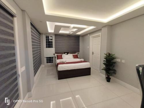 Voodi või voodid majutusasutuse Peppercorn Cottage, Vythiri. toas