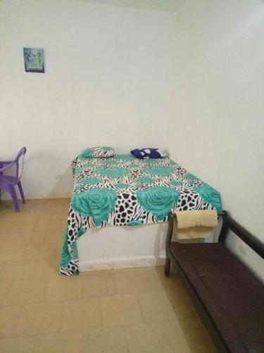 Ein Bett oder Betten in einem Zimmer der Unterkunft Chez Paolo