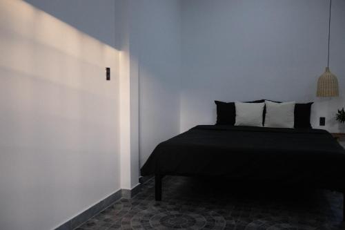 Łóżko lub łóżka w pokoju w obiekcie Gạo Homestay
