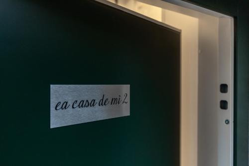a door with a sign that says can cant do mi at "Ea casa de mì 2", l'incanto di vivere Venezia in Venice