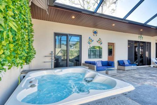 a jacuzzi tub in the middle of a house at Courtyard Home with Pool, Spa & Sauna close to Beach & City Center in Sarasota