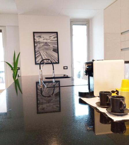 Η κουζίνα ή μικρή κουζίνα στο FrenzHouse - Terraced Apartment close to Rho Fiera and San Siro