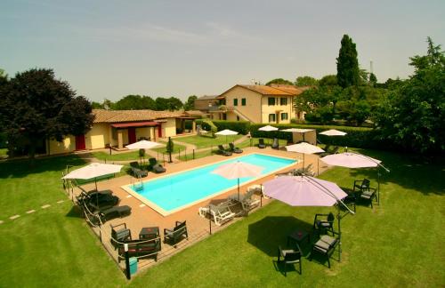 an overhead view of a swimming pool with umbrellas at Oasi di Agilla in Panicarola