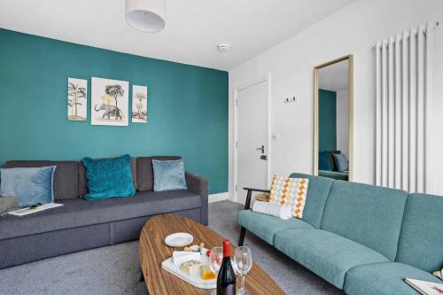 a living room with a couch and a table at Gloster Town House gorgeous family home Barnstaple in Barnstaple
