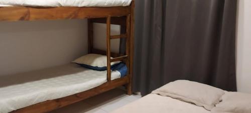 a bunk bed room with two bunk beds in it at casa campestre mundo nuevo in Ráquira