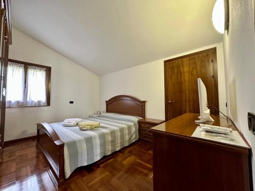 Ліжко або ліжка в номері Casa di Lily - Magnifico Giardino, parcheggio privato e Free Wifi