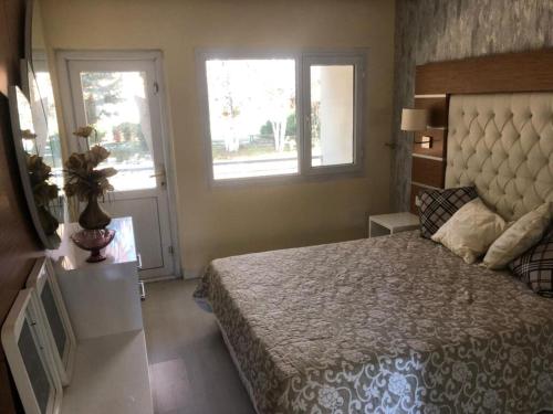 מיטה או מיטות בחדר ב-Emet Resort Apart Otel