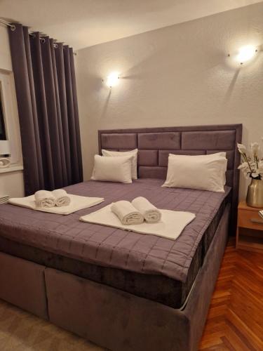 Ένα ή περισσότερα κρεβάτια σε δωμάτιο στο Apartman Avlija