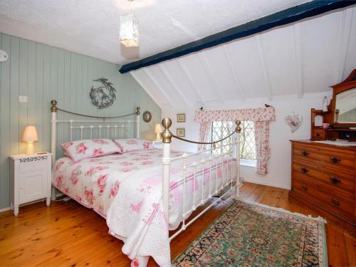 Postel nebo postele na pokoji v ubytování Bridge View Cottage