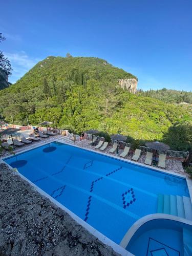 La alberca dentro o cerca de Acapulco Seaside Pool Bar and Apartments