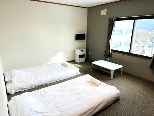 Cama o camas de una habitación en Pension Berg