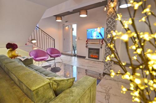 TV a/nebo společenská místnost v ubytování Residence Spa Apartments DUB