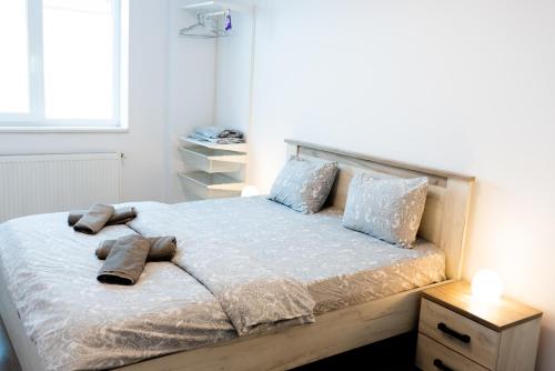 Postel nebo postele na pokoji v ubytování Thome White Flat