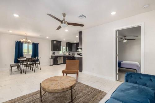 a living room with a couch and a table at Your Downtown Home With California King Bed Unit A in Phoenix