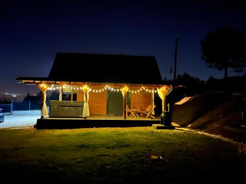 a house lit up at night with lights on it at Villa Ema in Pale