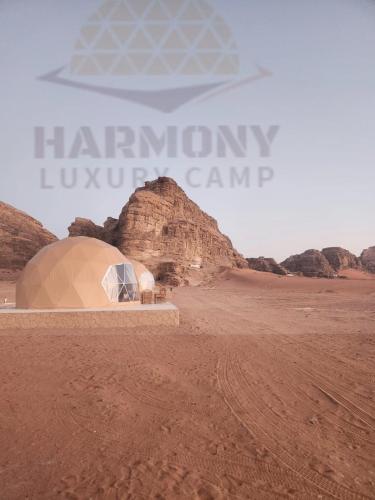 a tent in the middle of the desert at Harmony Luxury Camp in Wadi Rum